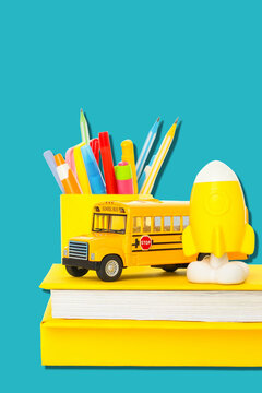 Back to school, Bright school supplies and a toy bus represent excitement for learning