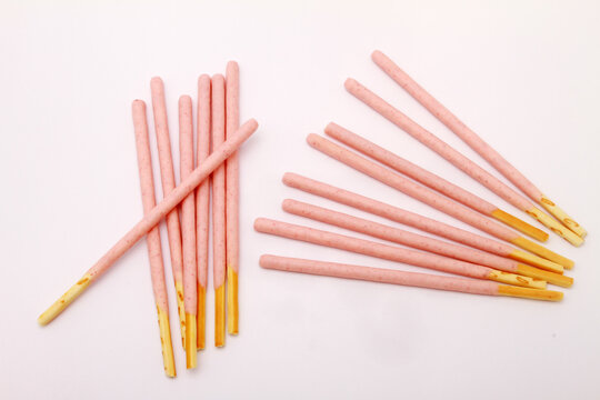 pink stick on white table