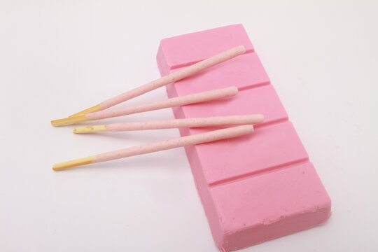 pink chocolate on white table