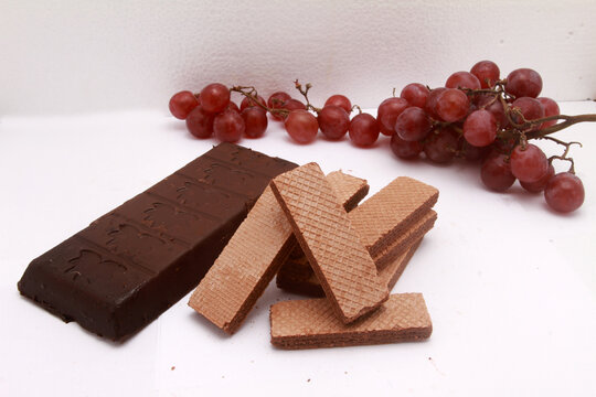 chocolate bar with waffle biscuit on table