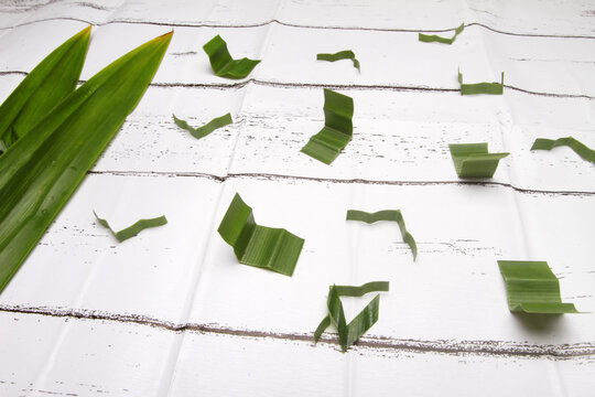 slice pandanus leaf on white table