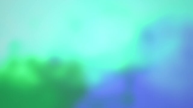 Abstract gradient background with soft teal and blue colors, ethereal blurred liquid motion, dreamy pastel atmospheric texture for video overlays