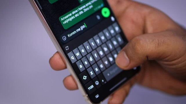 Close-Up of Mobile Texting with Shallow Depth of Field