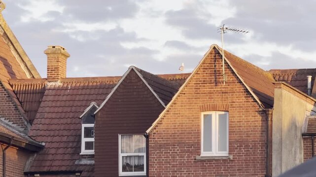 Red brick houses in Gosport, England, glowing in the warm sunset light