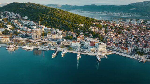 Aerial view of Split waterfront and marina at golden hour, Croatia