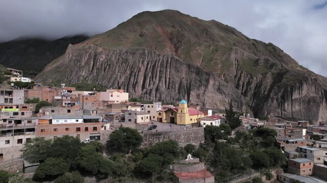 4K drone aerial view of Iruya, Salta, Argentina. A remote Andean village surrounded by dramatic mountains, deep valleys and winding roads in one of the most spectacular landscapes of northern Argentin
