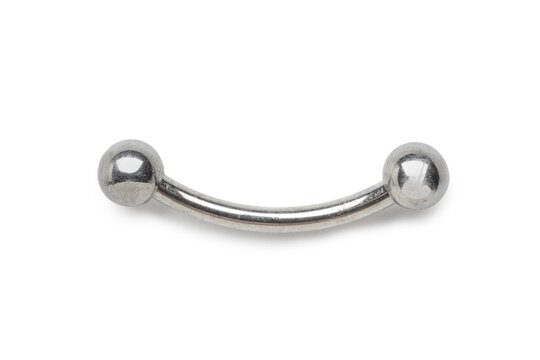 Silver curved barbell body piercing jewelry with two spherical ends, isolated on a clean white background