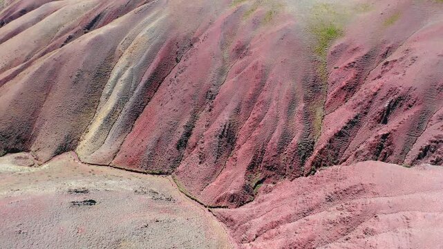 Red clay canyon. Aerial video from drone of Altai mountain landscape. Camera looks down.