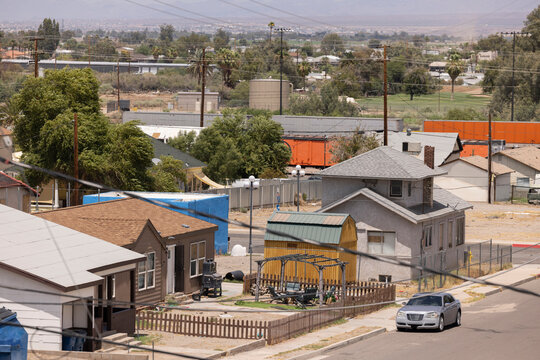Afternoon hot summer view of buildings and surroudning mountains of Needles, California, USA.