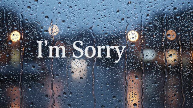 Heartfelt apology text displayed on a window during rain at night with glowing bokeh and moody atmosphere