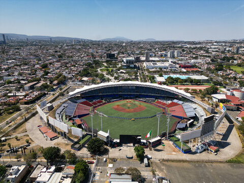 Zapopan, Mexico - February 21 2026: Panoramic aerial drone view showcasing Charros de Jalisco Stadium, home to a prominent baseball team, amidst the urban landscape of Zapopan city, Jalisco