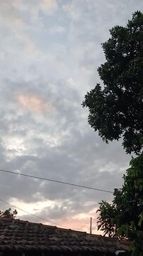 roof of the house with cloudy sky