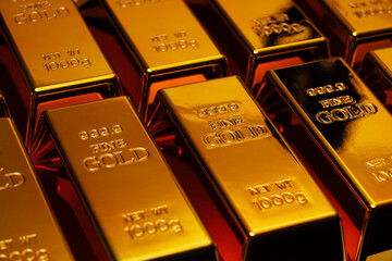 Obraz na płótnie Canvas Gold bar in investment. Gold bar in precious metal for luxury bullion. Gold bar metal background for ingots. Gold bar background.