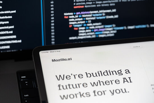 Mozilla Ai company web page on program code background