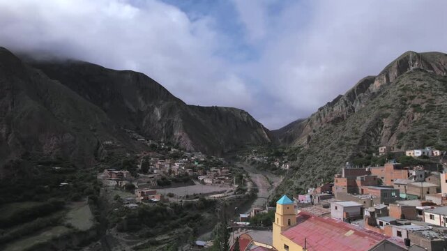 4K drone aerial view of Iruya, Salta, Argentina. A remote Andean village surrounded by dramatic mountains, deep valleys and winding roads in one of the most spectacular landscapes of northern Argentin