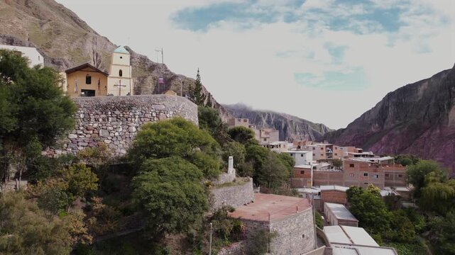 4K drone aerial view of Iruya, Salta, Argentina. A remote Andean village surrounded by dramatic mountains, deep valleys and winding roads in one of the most spectacular landscapes of northern Argentin