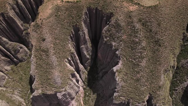4K drone aerial view of Abra del C&oacute;ndor on the road to Iruya, Salta, Argentina. Spectacular Andean mountain pass with dramatic valleys, winding routes and breathtaking high altitude landscapes.