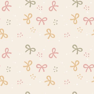 Seamless pastel bow pattern on beige background for textiles