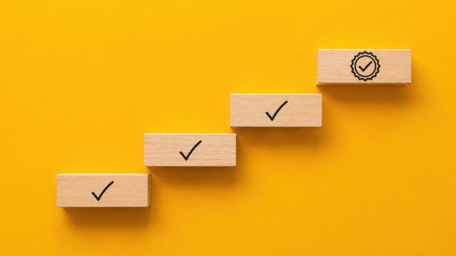 Wooden blocks with checkmarks showing business success steps