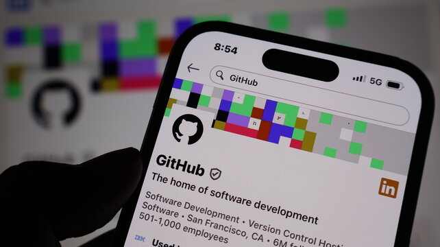 GitHub company profile page on mobile device with colorful pixelated header for software development community.