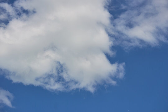 Fluffy White Cumulus Cloud in Blue Sky Background