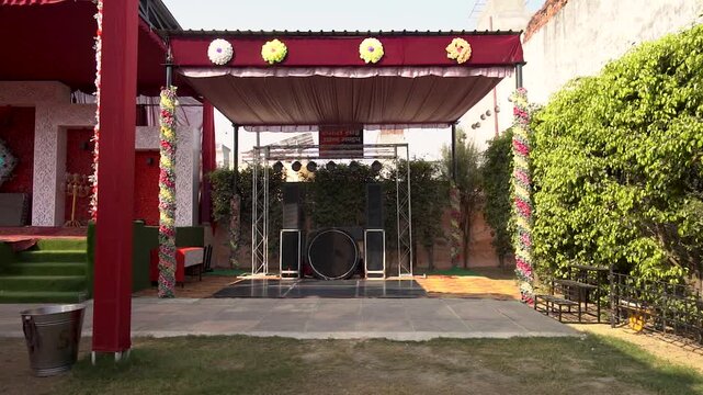 Outdoor Wedding Stage Setup with Floral Decorations
