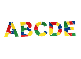 Colorful mosaic letters a b c d e made of small pieces © Riazuddin