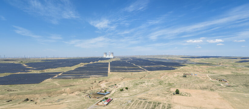 Solar and Wind Power Farm with Coal-Fired Plant at Arid Desert Grassland Energy Base