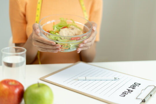 Diet and dieting. diet plan and check calories for healthy food. weight loss, lose, balance, control, reduce fat, low calories, routines, exercise, body shape, healthy foods.