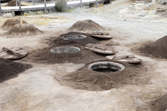 Holes for the cooking pits in the hot springs of Caldera in Vale das Furnas, Sao Miguel, Azores, Portugal 