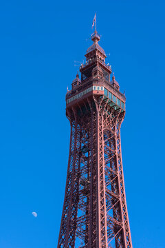 Blackpool, UK &ndash; May 24, 2026: Blackpool Tower and daytime moon under blue sky