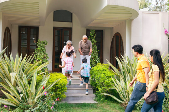 Grandparents welcoming their grandchildren