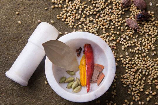 Marble mortar and pestle with�spices