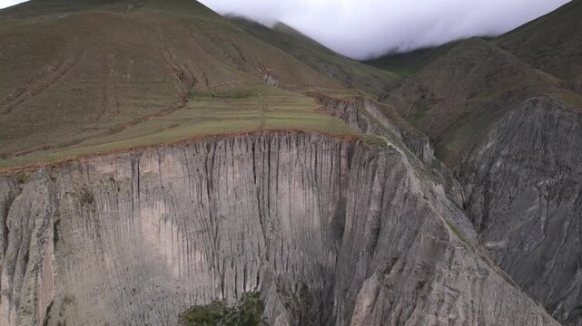 4K drone aerial view of Iruya, Salta, Argentina. A remote Andean village surrounded by dramatic mountains, deep valleys and winding roads in one of the most spectacular landscapes of northern Argentin