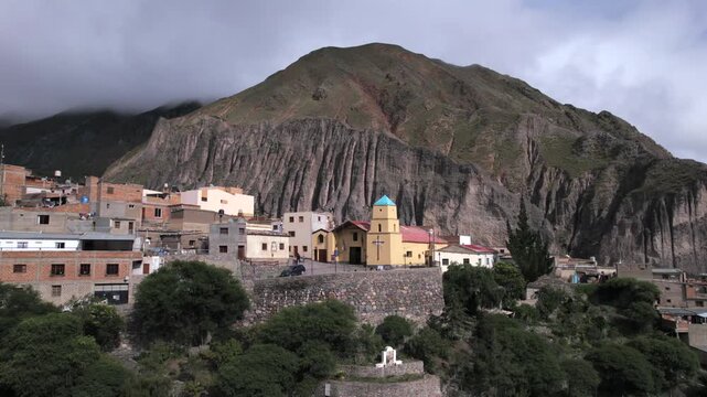 4K drone aerial view of Iruya, Salta, Argentina. A remote Andean village surrounded by dramatic mountains, deep valleys and winding roads in one of the most spectacular landscapes of northern Argentin