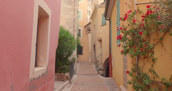 A Charming View of a Medieval Village Street, Featuring Colorful Historic Buildings, Narrow Pathways, and the Timeless Beauty of Roquebrune-Cap-Martin on the French Riviera, France - Medium Shot