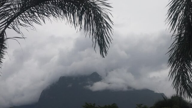 Beautiful cloud formations preceding the rain, covering Doi Luang Chiang Dao mountain in Chiang Dao district, Chiang Mai province