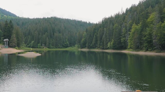 Synevyr Lake Surrounded by Forested Mountains, Ukraine
