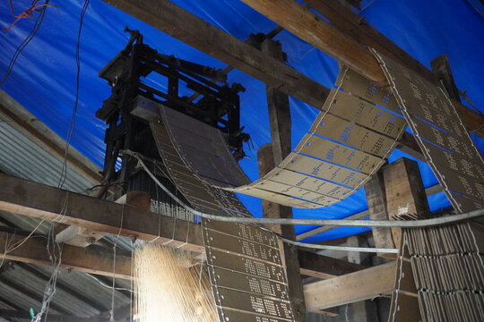 Jacquard Loom with Punched Cards Controlling Textile Weaving
