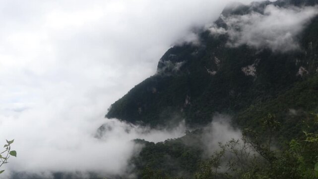 Beautiful cloud formations preceding the rain, covering Doi Luang Chiang Dao mountain in Chiang Dao district, Chiang Mai province