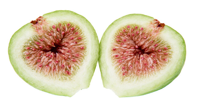 Fresh green fig cut in half showing seeds and pulp