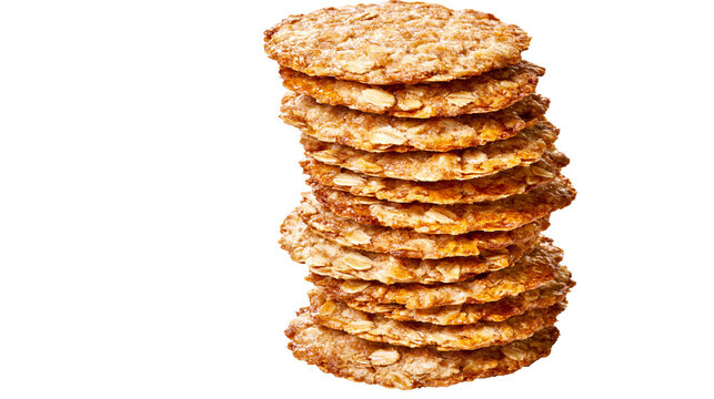 Stack of golden brown oatmeal cookies with visible oats
