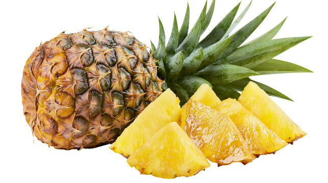 Whole pineapple with green leaves and sliced wedges
