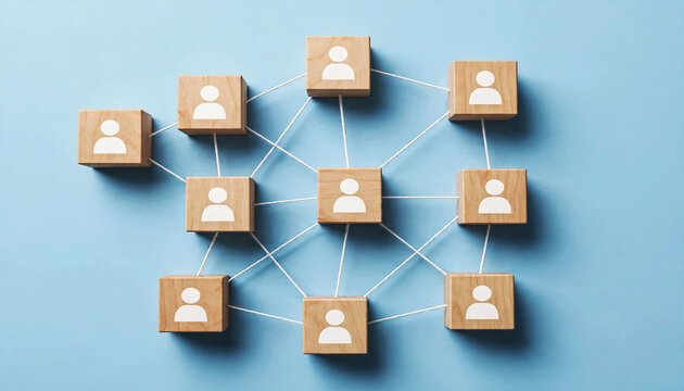 Wooden blocks with people icons connected by white lines on blue background representing human resources, team networking, business organizational structure and corporate recruitment