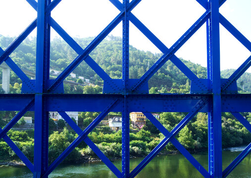 Steel Lattice Railway Bridge Truss and Train Tracks Crossing River