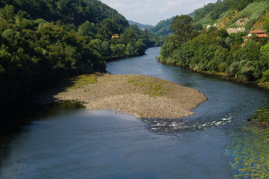 Low Water Level during exceptionally hot spell in Minho River in Os Peares, Galicia, Spain 