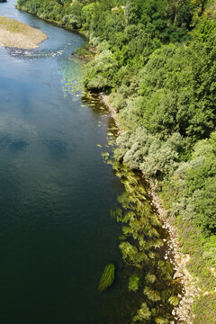 Low Water Level during exceptionally hot spell in Minho River in Os Peares, Galicia, Spain 