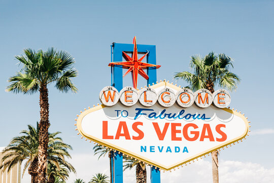 The famous Las Vegas welcome sign with palm trees