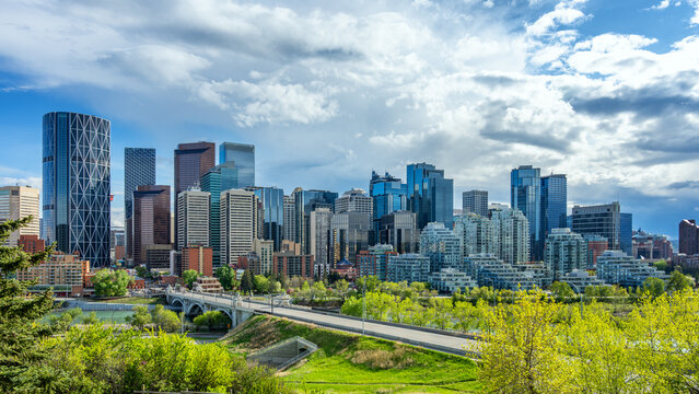 Calgary's modern downtown skyline with skyscrapers along the Bow River