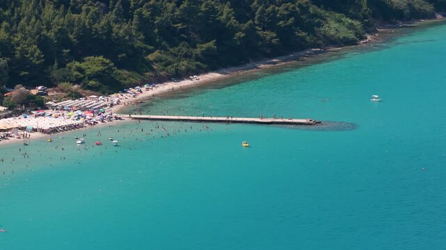 Kallithea coastline featuring turquoise water a busy beach